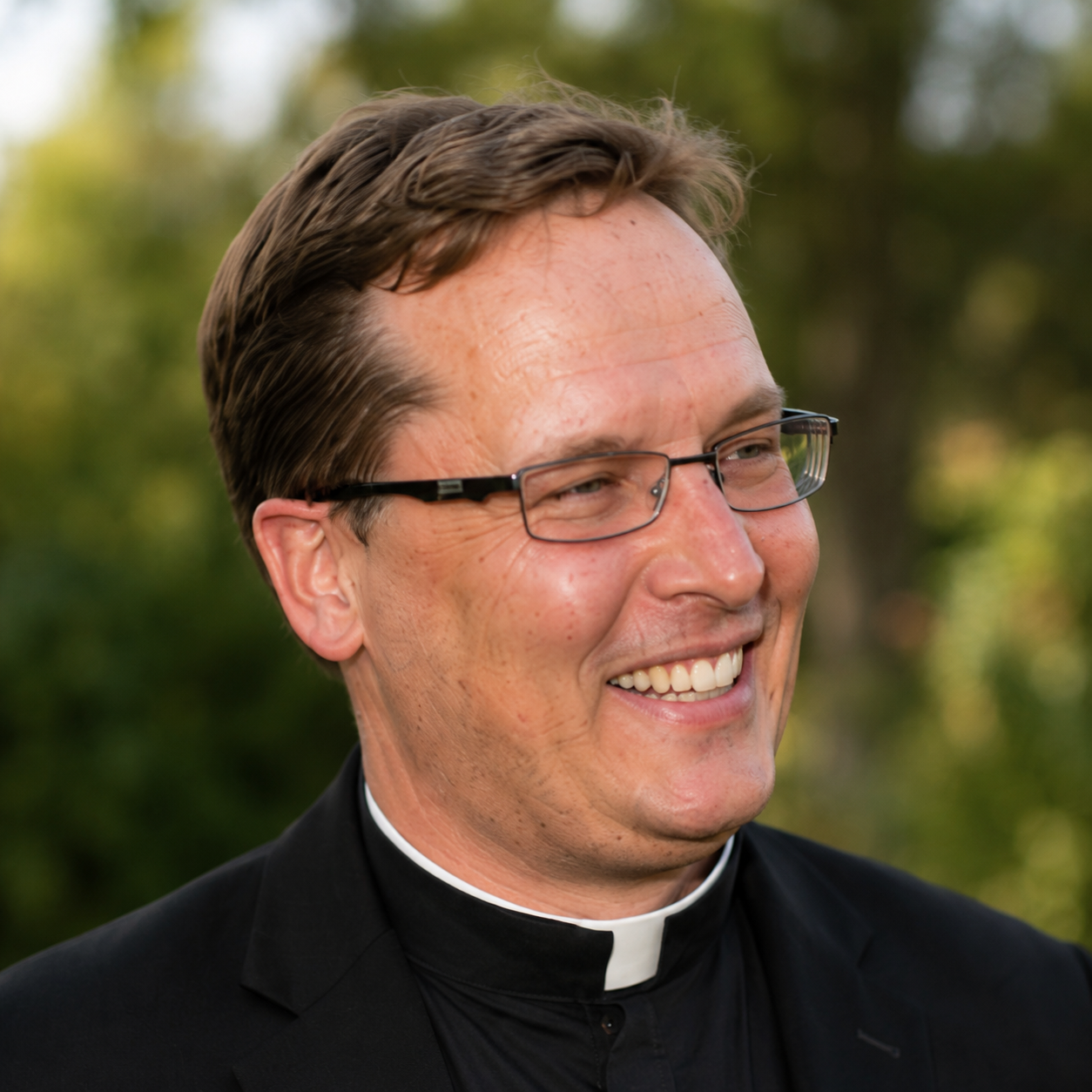 Father Chris Nerreau, Maddie's uncle and the priest who blesses every bracelet.